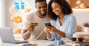 Couple shopping online with a smartphone and laptop, using a credit card for digital payments.